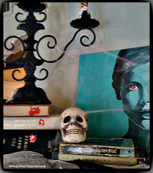 Old books, cobwebs, candelabra - Halloween decor